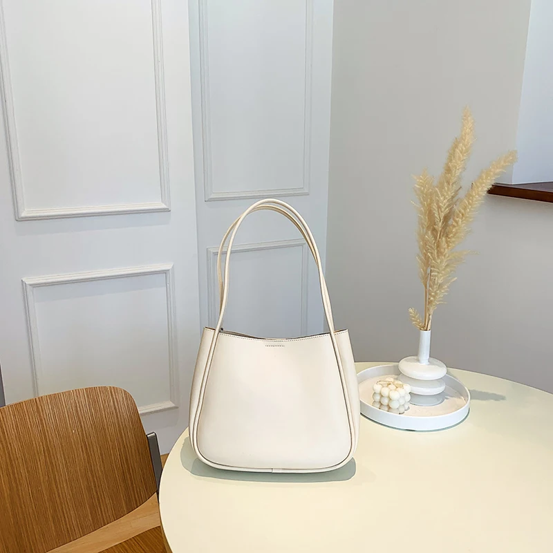 Simple And Casual New Popular PU Leather Versatile Shoulder Underarm Bag Small Fresh Solid Color Bear Pendant Handbag - Image 9