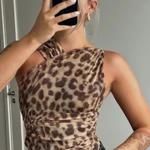 Women Leopard Tulle Bodysuit 2025 Summer Hollow Out Irregular Straps Snap-botton for Holiday Beach Style Streetwear